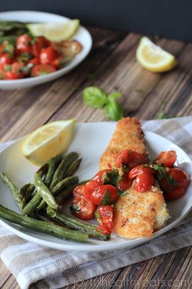 The Most Popular Recipes of Joyful Healthy Eats 2014 | m.albarakaa.com | #mostpinned #healthy #recipes #food Breaded fish with tomatoes and green beans on a plate