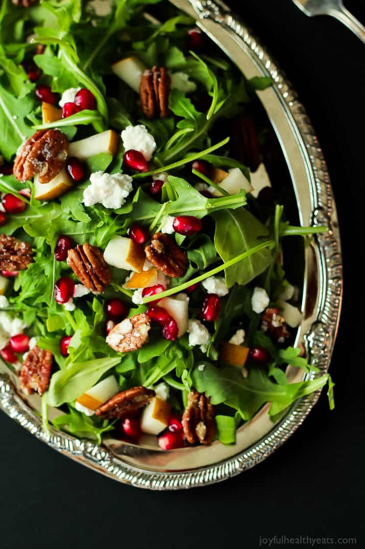 Pomegranate Goat Cheese Candied Pecan Arugula Salad. The perfect salad to change up your holiday menu, easy to make and absolutely delicious! | m.albarakaa.com 石榴山羊芝士蜜饯山核桃芝麻菜沙拉。完美的沙拉改变您的假日菜单,容易制作和绝对美味!| m.albarakaa.com