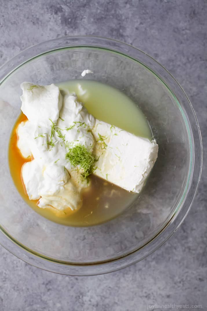 Easy No Bake Key Lime Cheesecake made healthy by using greek yogurt. A perfect light summer dessert to wow the crowd!