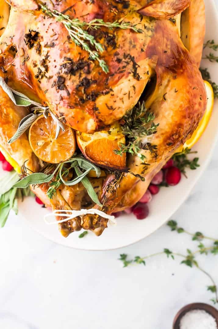 The Best Thanksgiving Turkey Recipe without Brining A roasted turkey cavity stuffed with orange slices and herbs