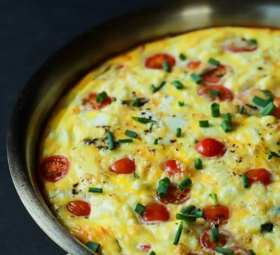 A Cheesy Bacon Spinach Frittata done in 30 minutes! This Spinach Frittata is packed with goat cheese, roasted red peppers, and bacon! Perfect for Brunch! | joyfulhealthyeats.com #easter #mothersday #recipes